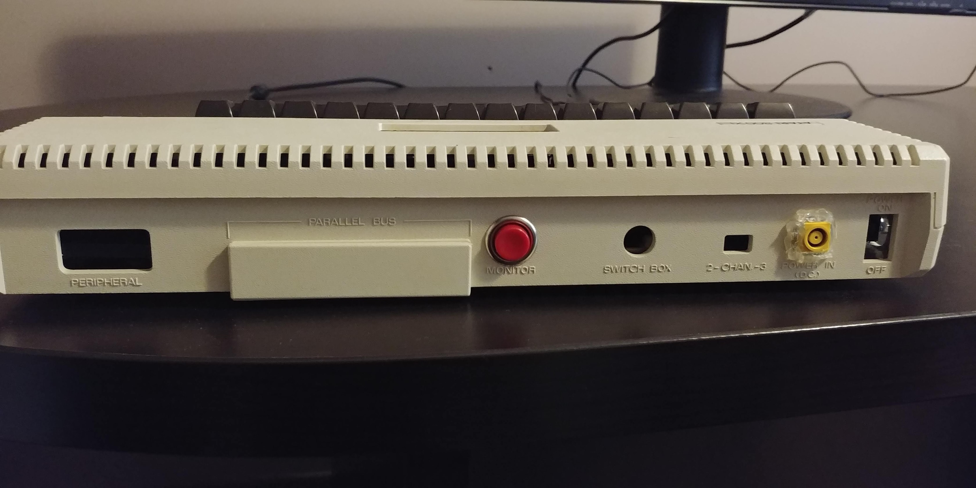 Back of the finished product. The power button fit perfectly in the 'monitor' slot, so I couldn't resist.