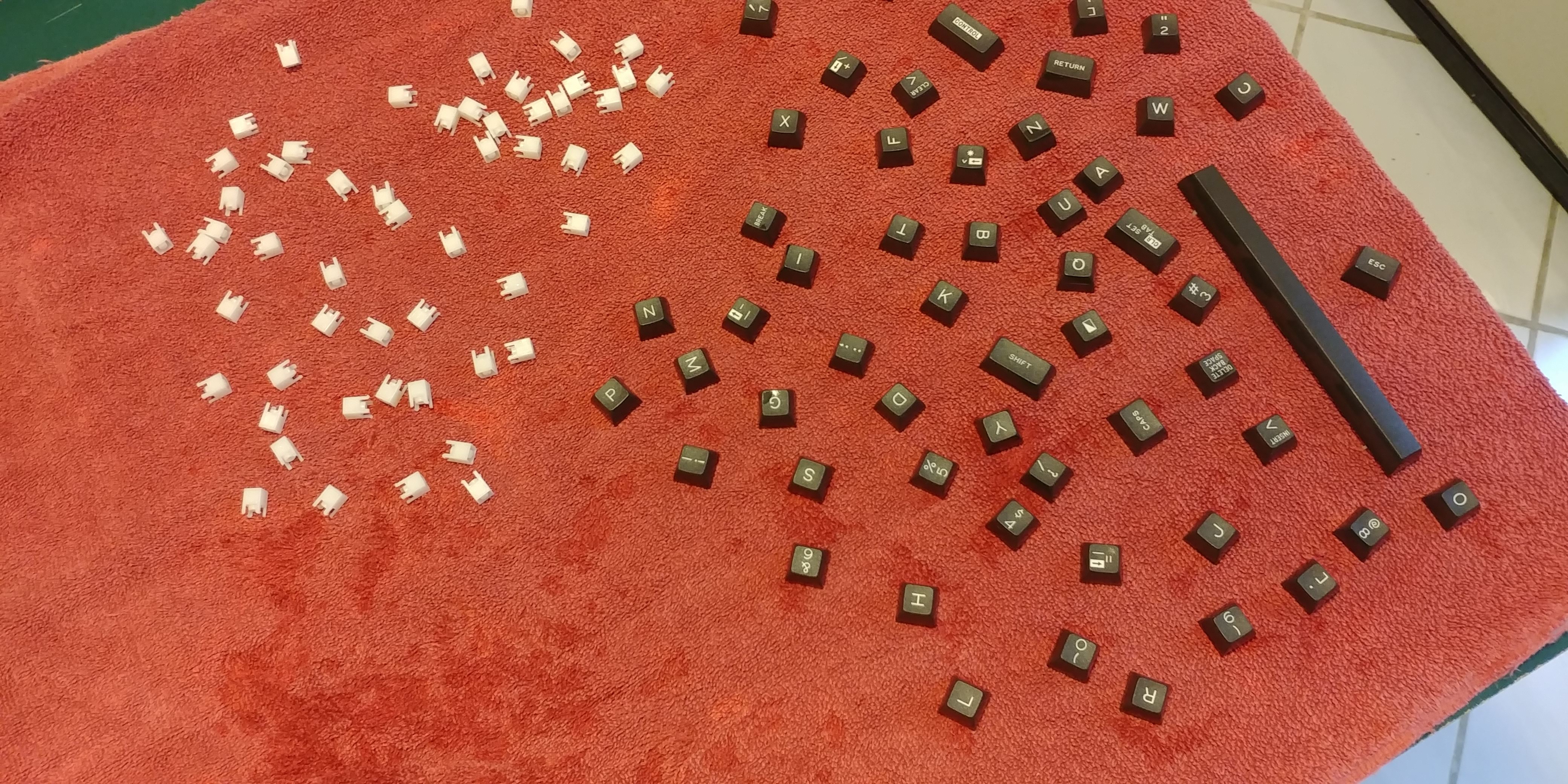 I washed all the key caps with warm water and dish soap, since they have probably been sitting around since the 80s.